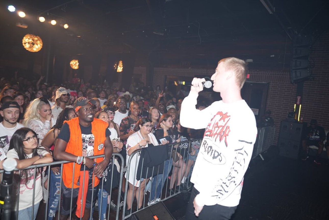 C-Hold performing at the edge of the stage at Screwfest 2024